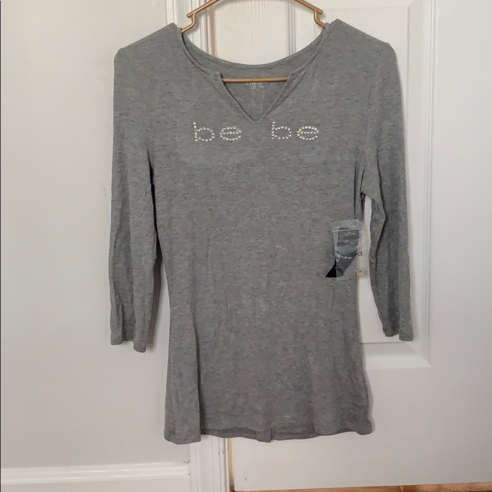 Gray v neck shirt